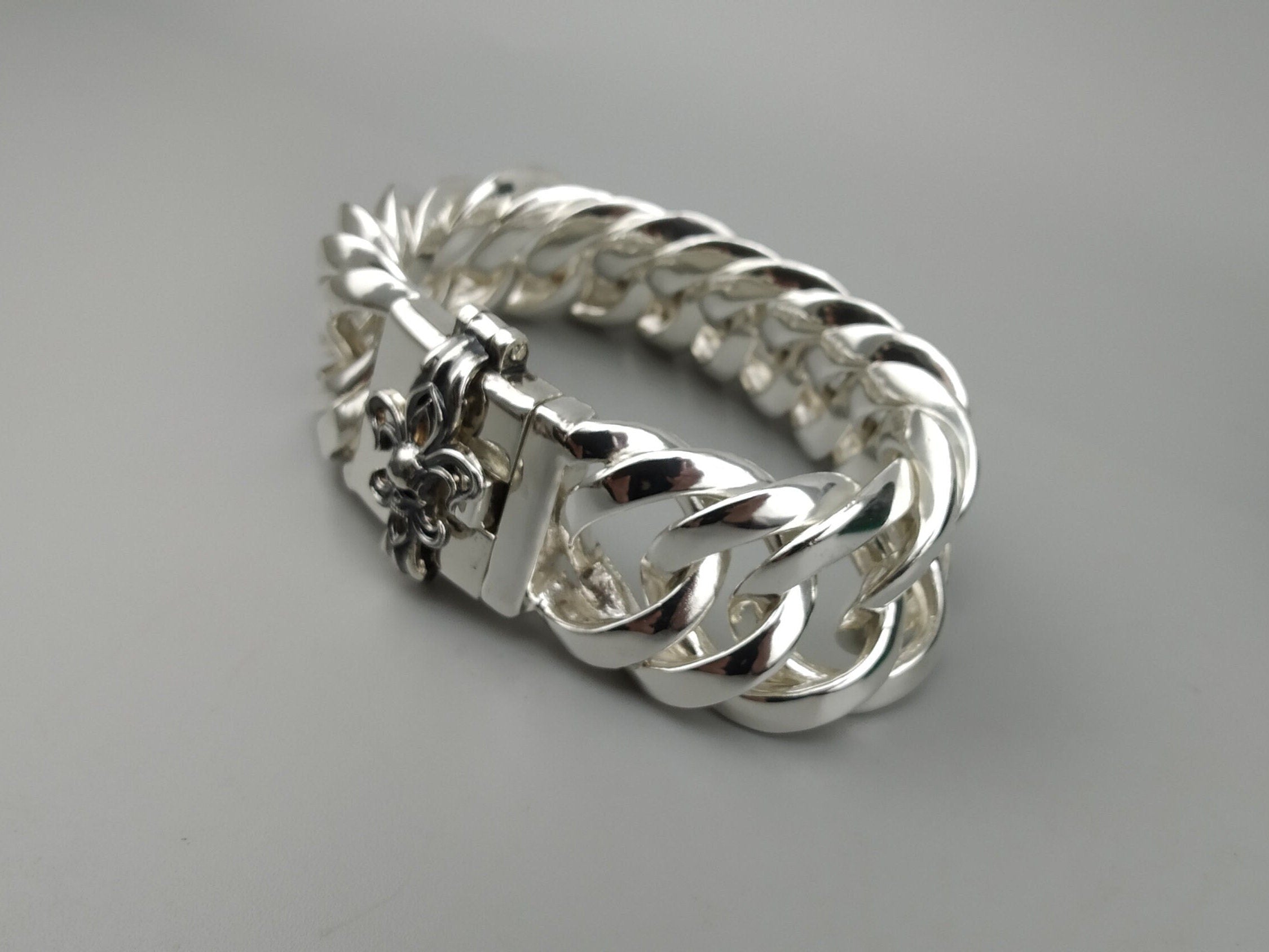 Heavy 925 sterling silver Cuban link bracelet with gothic skull emblem clasp