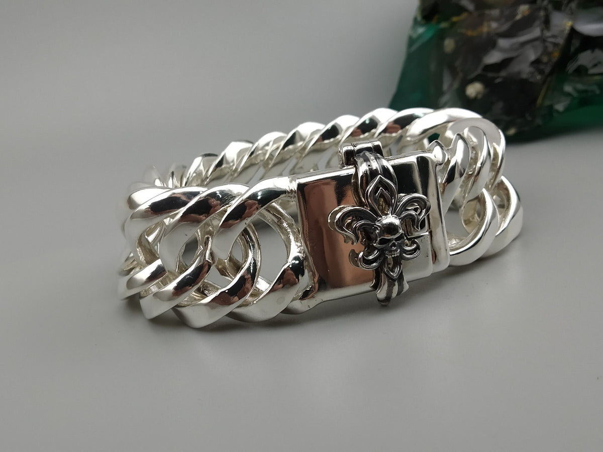 Heavy 925 sterling silver Cuban link bracelet with gothic skull emblem clasp