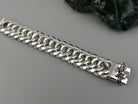 Heavy 925 sterling silver Cuban link bracelet with gothic skull emblem clasp