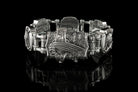 Heavy silver biker bracelet side view on black background