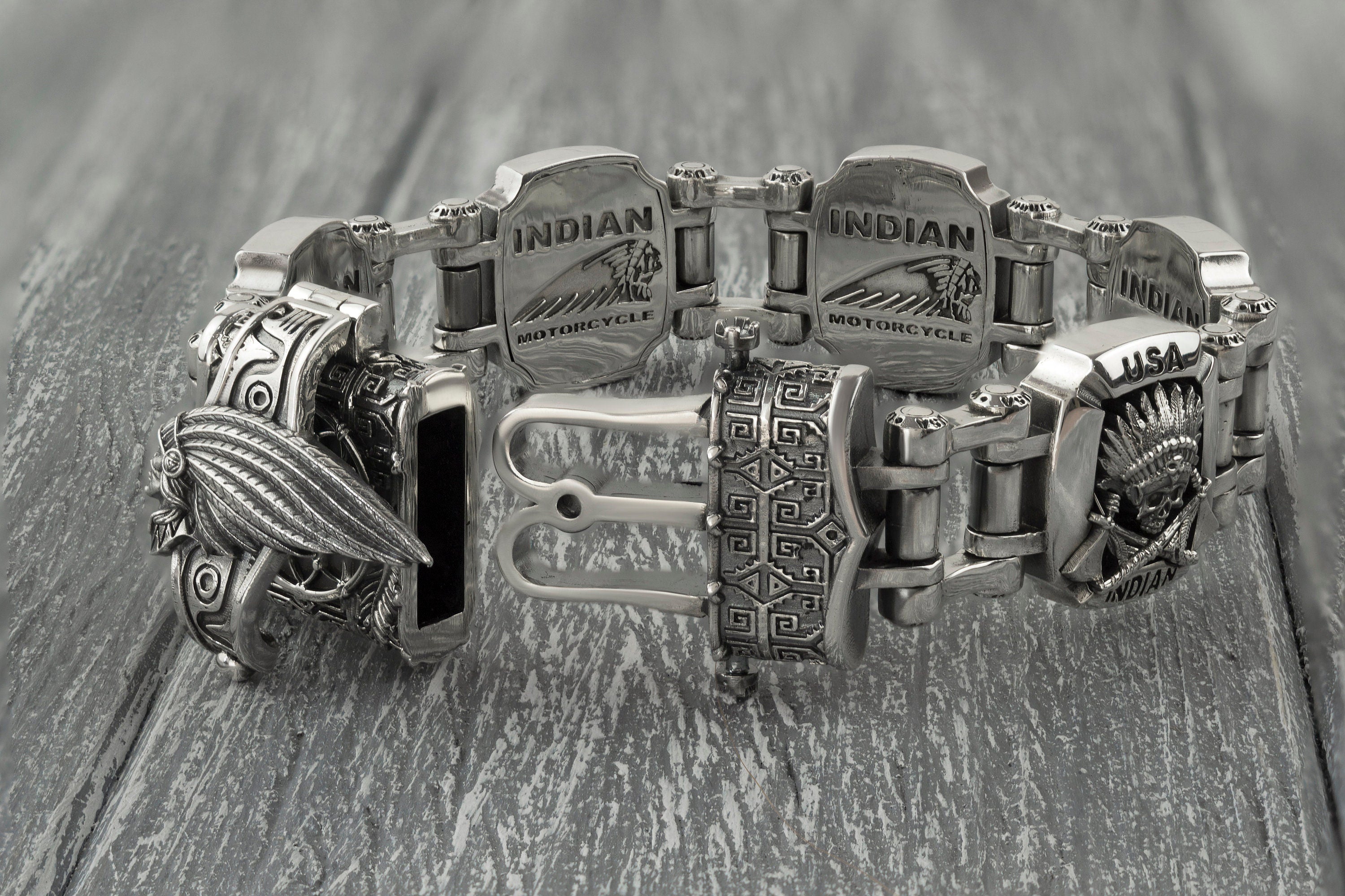 Indian heavy bracelet laid straight, engraved plate details