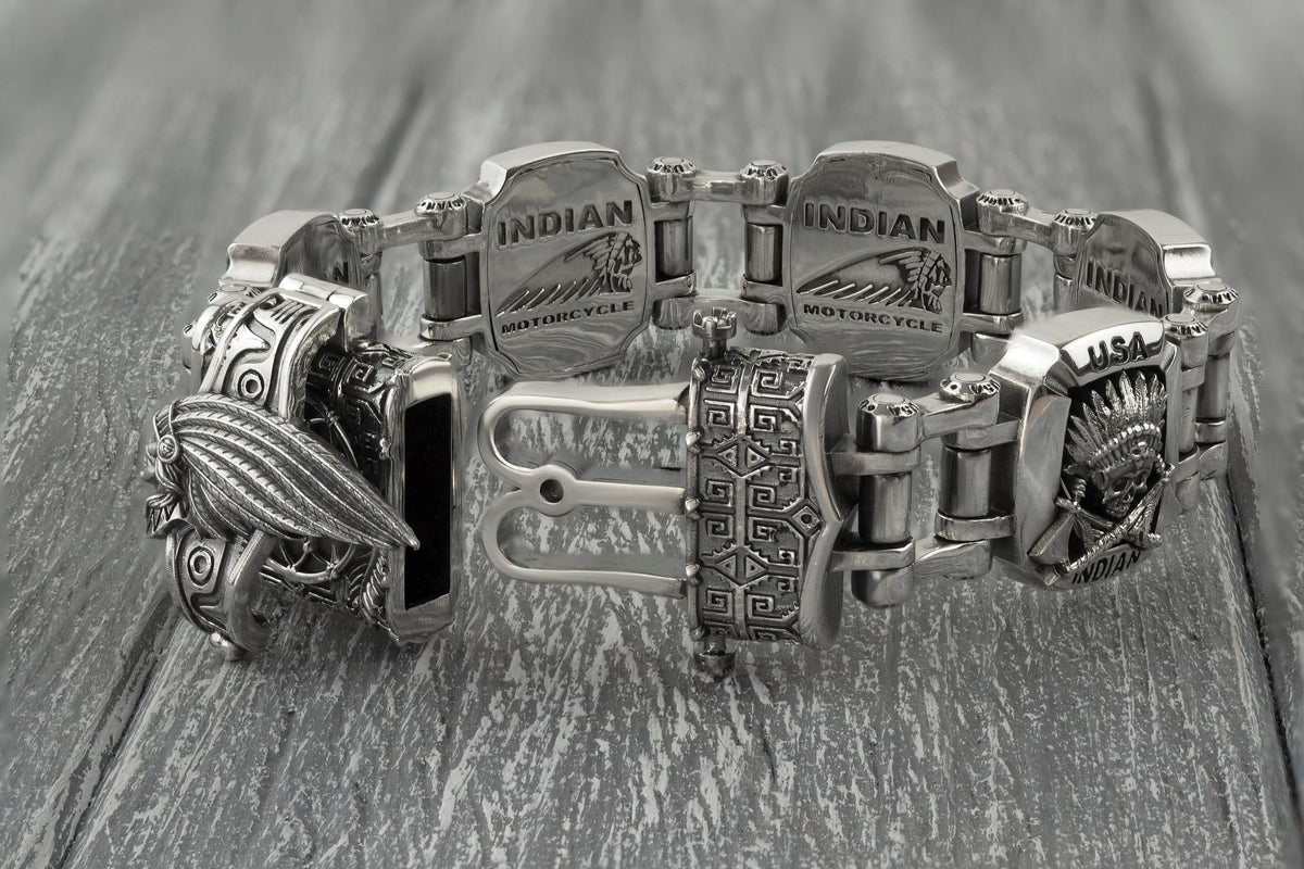 Indian heavy bracelet laid straight, engraved plate details