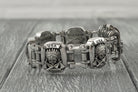 Indian sterling silver bracelet on a light background, full view