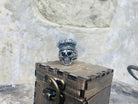 King of Shadow men's skull ring on a wooden box, top view