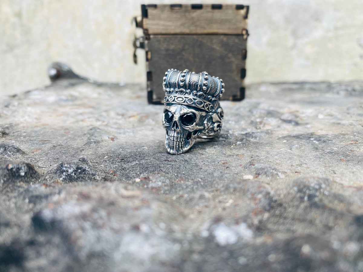 Oxidized silver crowned skull ring, other side view