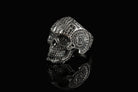 Mexican skull ring side view with ornamental cheek detail