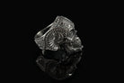 Sugar skull silver ring seen from above, decorated forehead