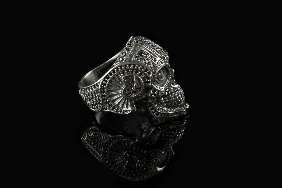 Sugar skull silver ring seen from above, decorated forehead