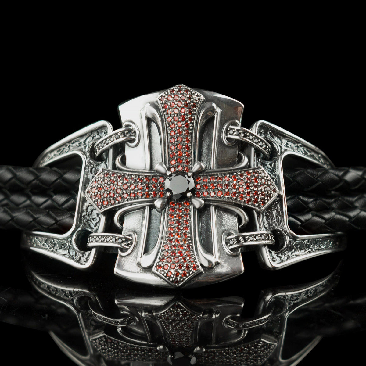 Front view of the medieval cross shield with red stones on black leather