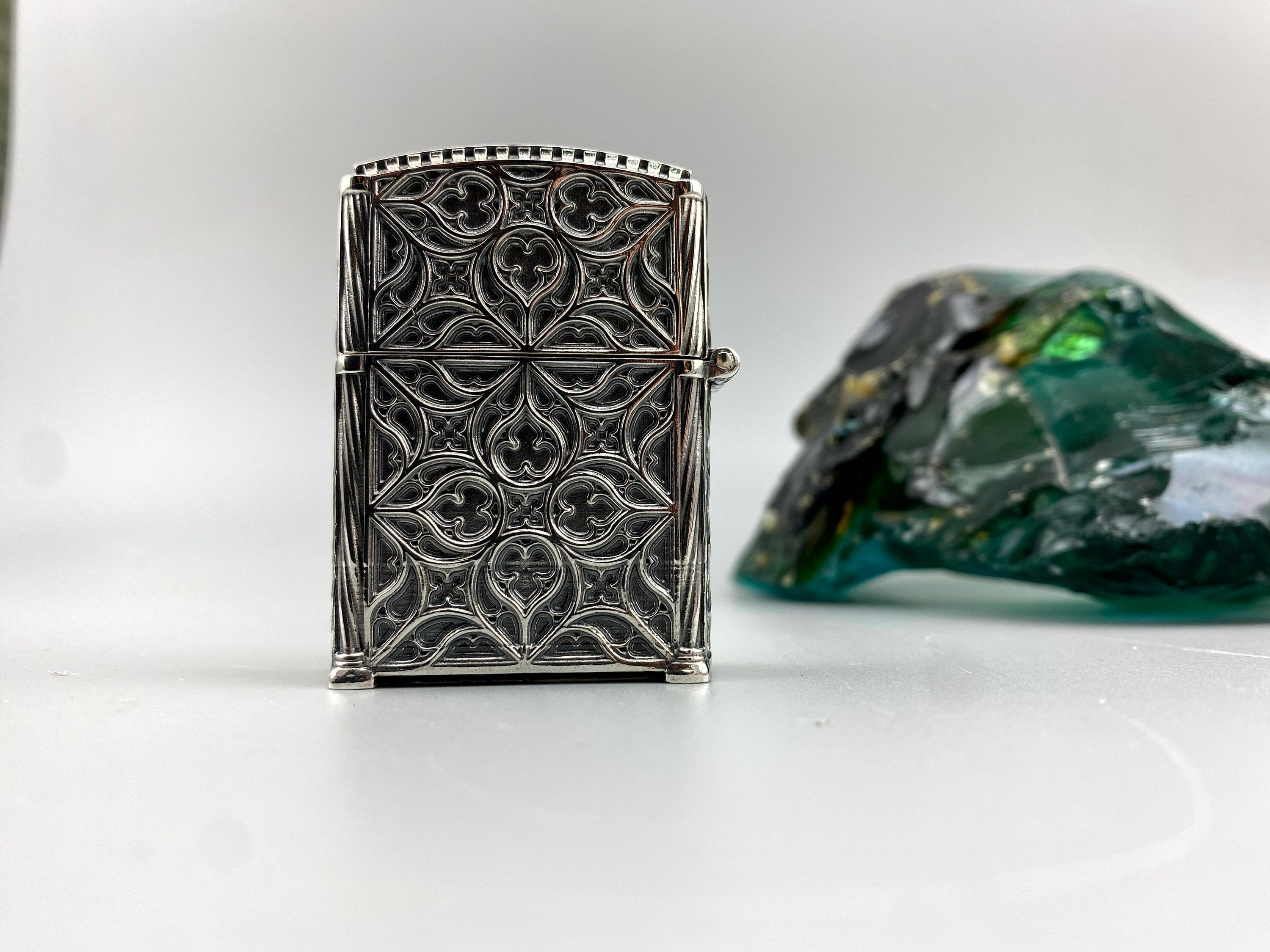 Side view of the heavy gothic silver lighter case
