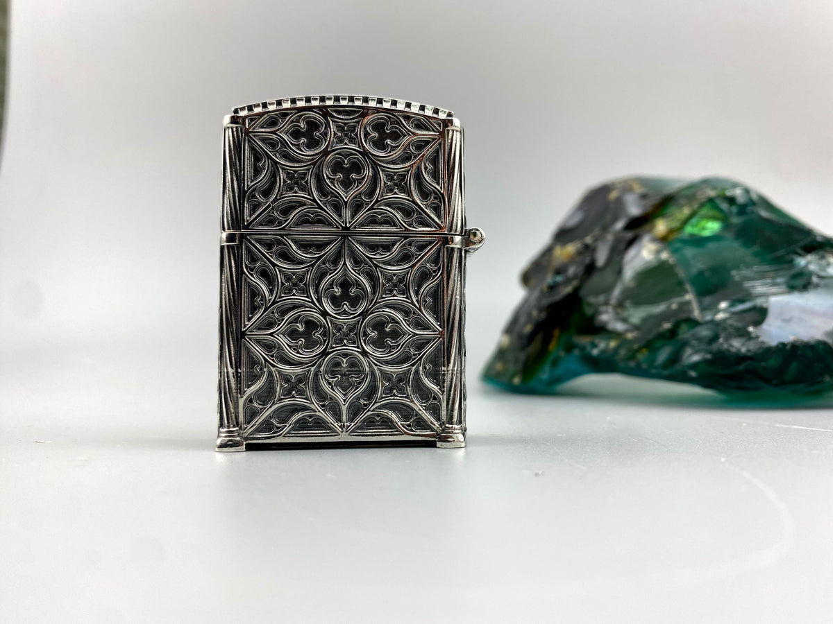 Side view of the heavy gothic silver lighter case