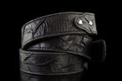 Close-up of the distressed rock texture and edge stitching on the leather strap