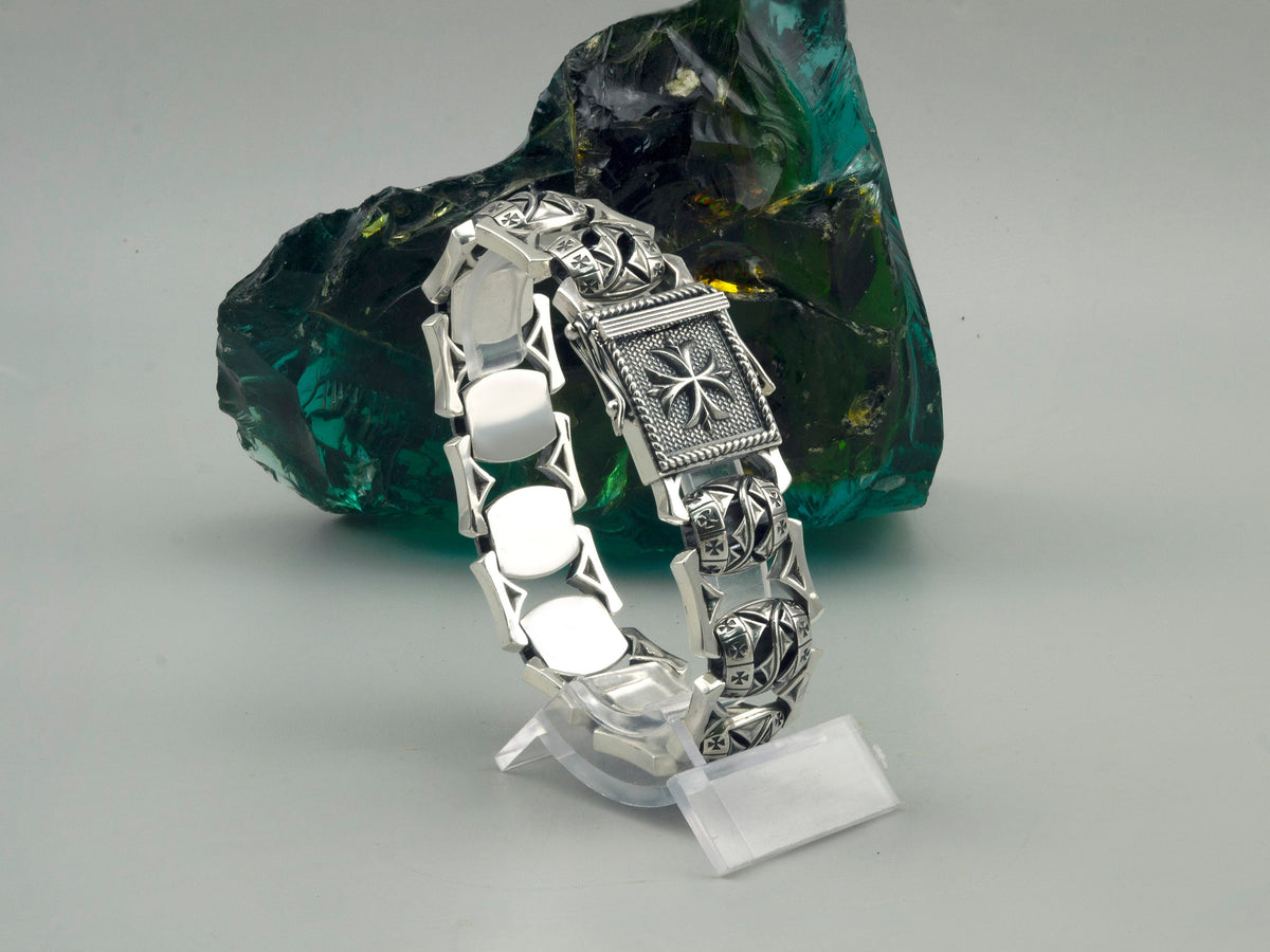 Royal Blessing bracelet on a stand, polished inner side of the links