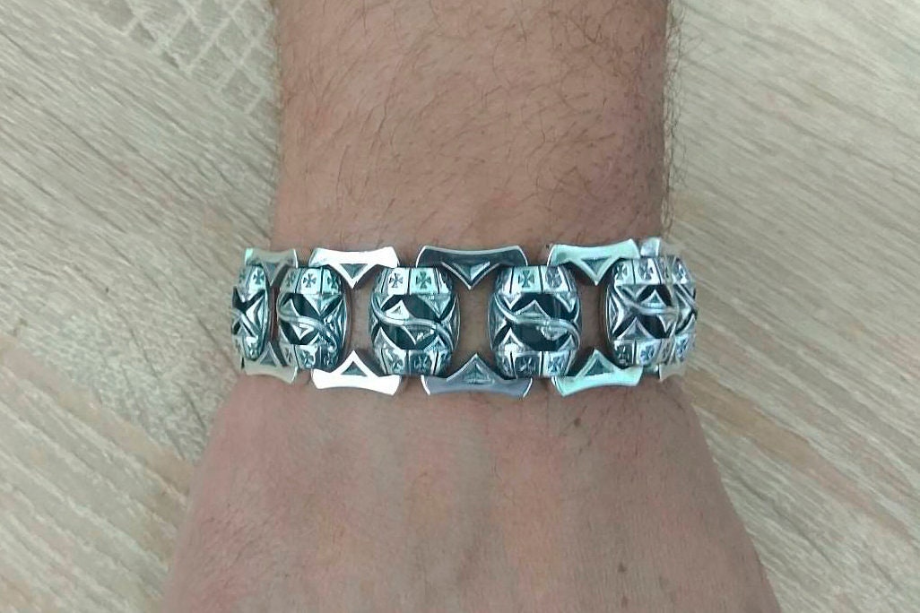 Royal Blessing Maltese cross silver bracelet worn on the wrist