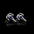 Silver scorpion stud earrings with dark blue cubic zirconia
