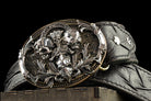 Close-up of the three skulls on the See No Evil belt buckle