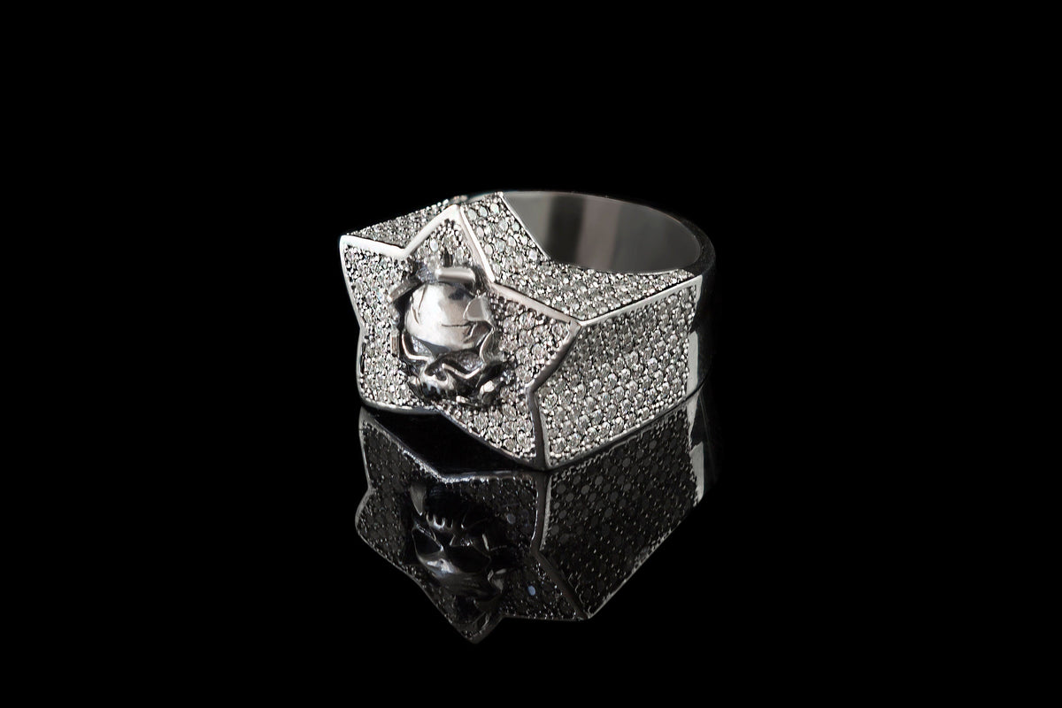 Sky's The Limit pave star ring with central skull, angled view