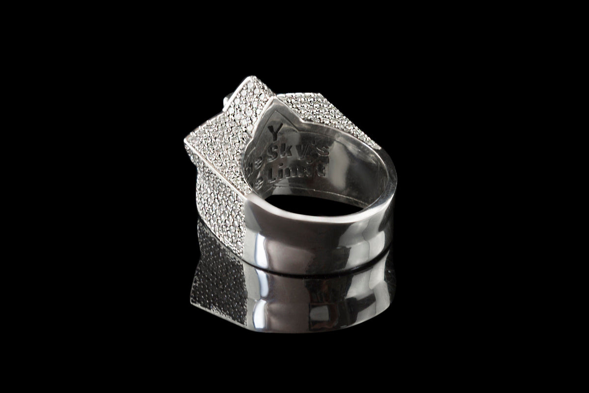 Side view of the clear CZ star skull ring and silver band