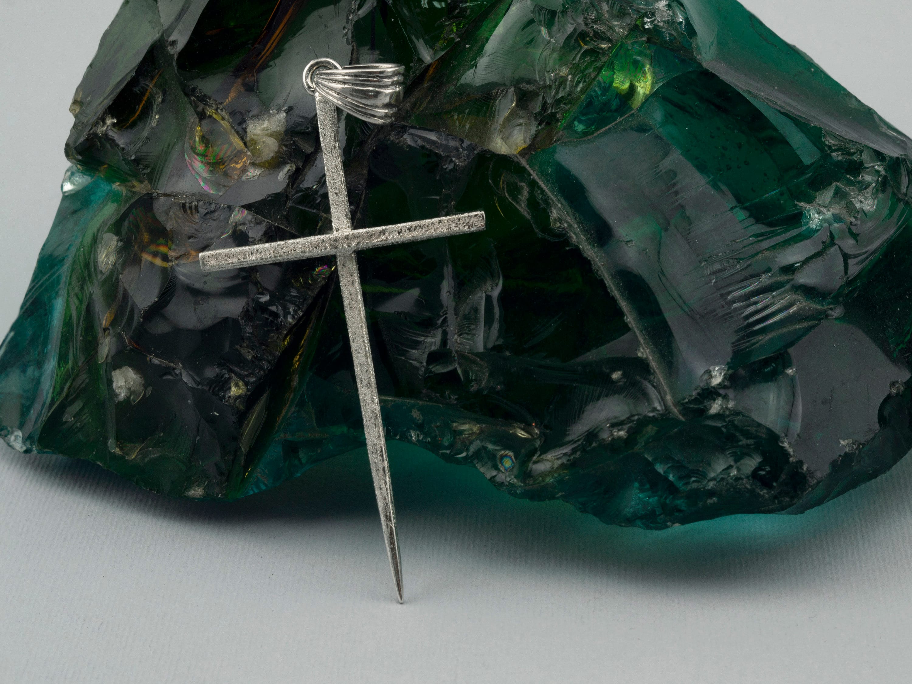 Men's silver spike cross pendant, full length with pointed end