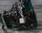 Heavy Thor's hammer pendant, side face with rune in relief and heavy bail