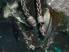 Close-up of the animal head chain terminals at the clasp of the Thor necklace set