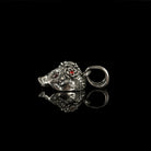 Tiny Frida sterling silver floral skull pendant with red stone eyes, side