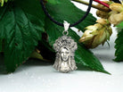 Sterling silver pendant of a Ukrainian woman with a floral wreath, detail 2