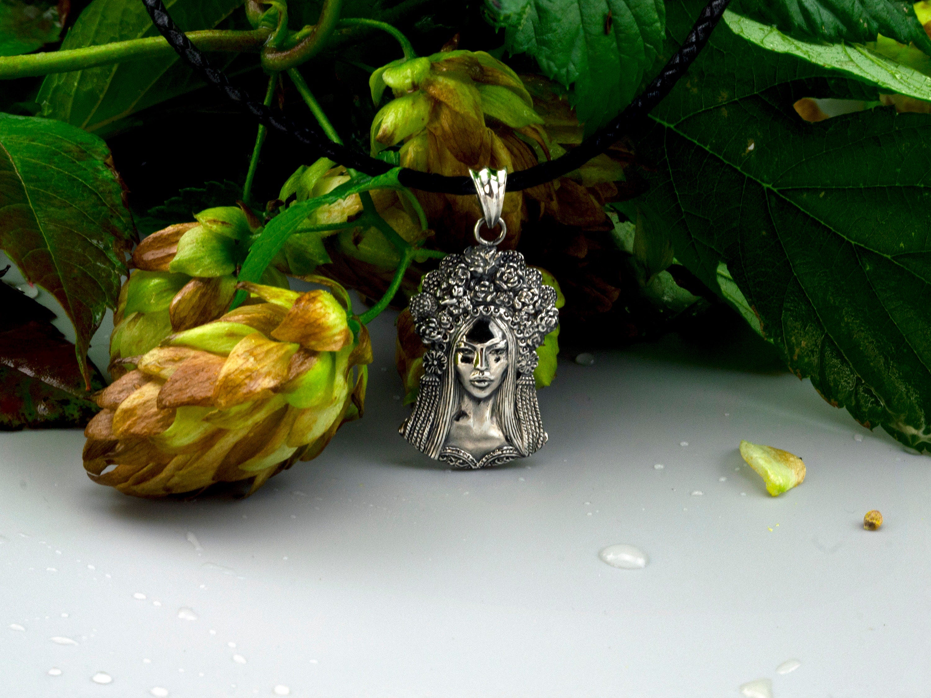 Sterling silver pendant of a Ukrainian woman with a floral wreath, detail 5