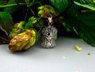 Sterling silver pendant of a Ukrainian woman with a floral wreath, detail 5
