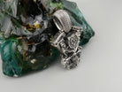V-twin skull pendant angled view with engine details and bail
