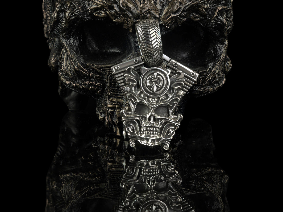 Vigor skull pendant on black background, front view