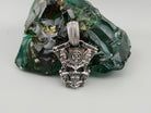 Vigor skull pendant front view with fleur-de-lis emblem