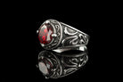 Men's Viking silver ring with red stone, opposite angle with reflection