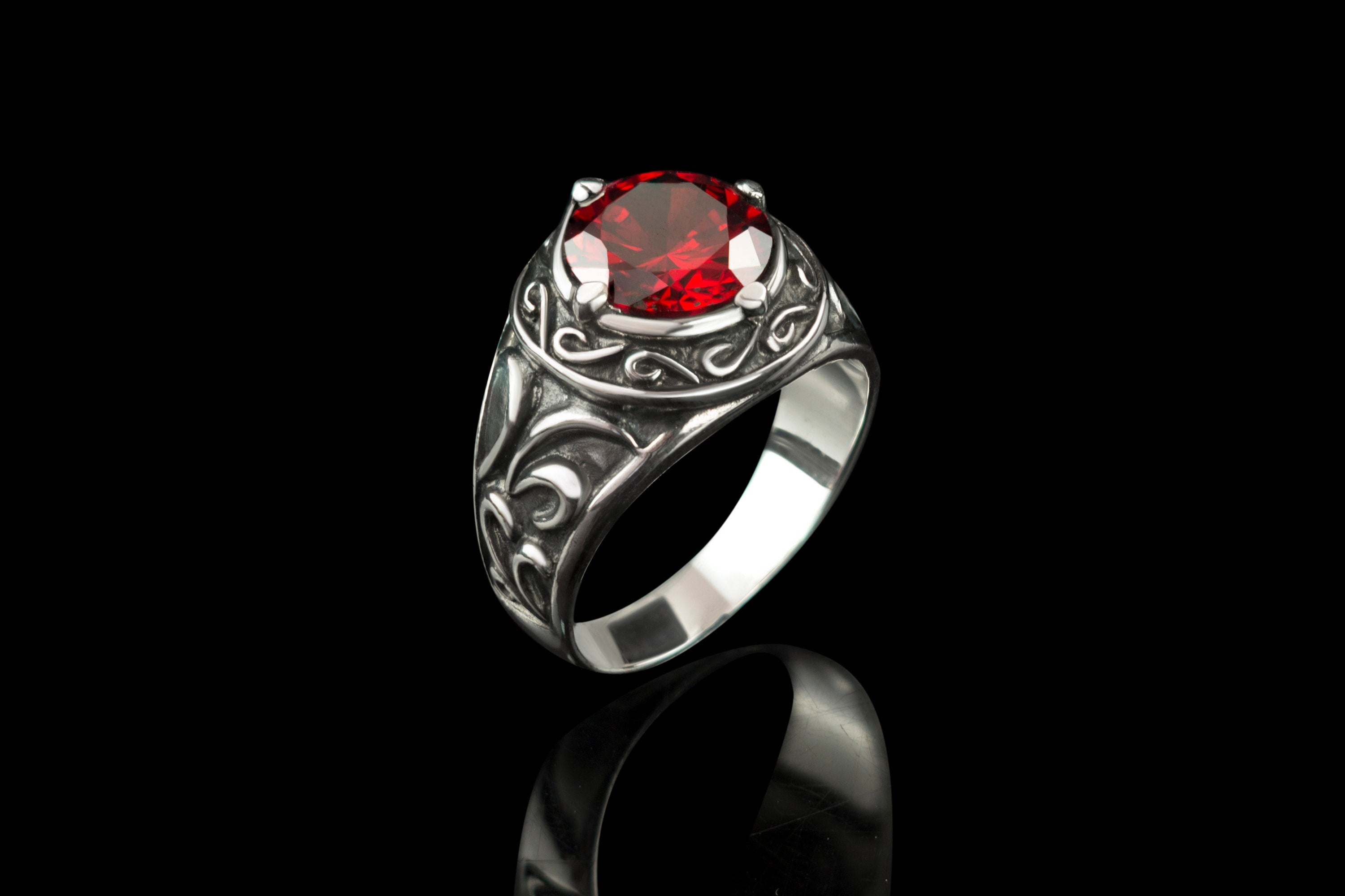 Viking red stone ring standing upright, three-quarter view