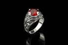 Viking red stone ring standing upright, three-quarter view
