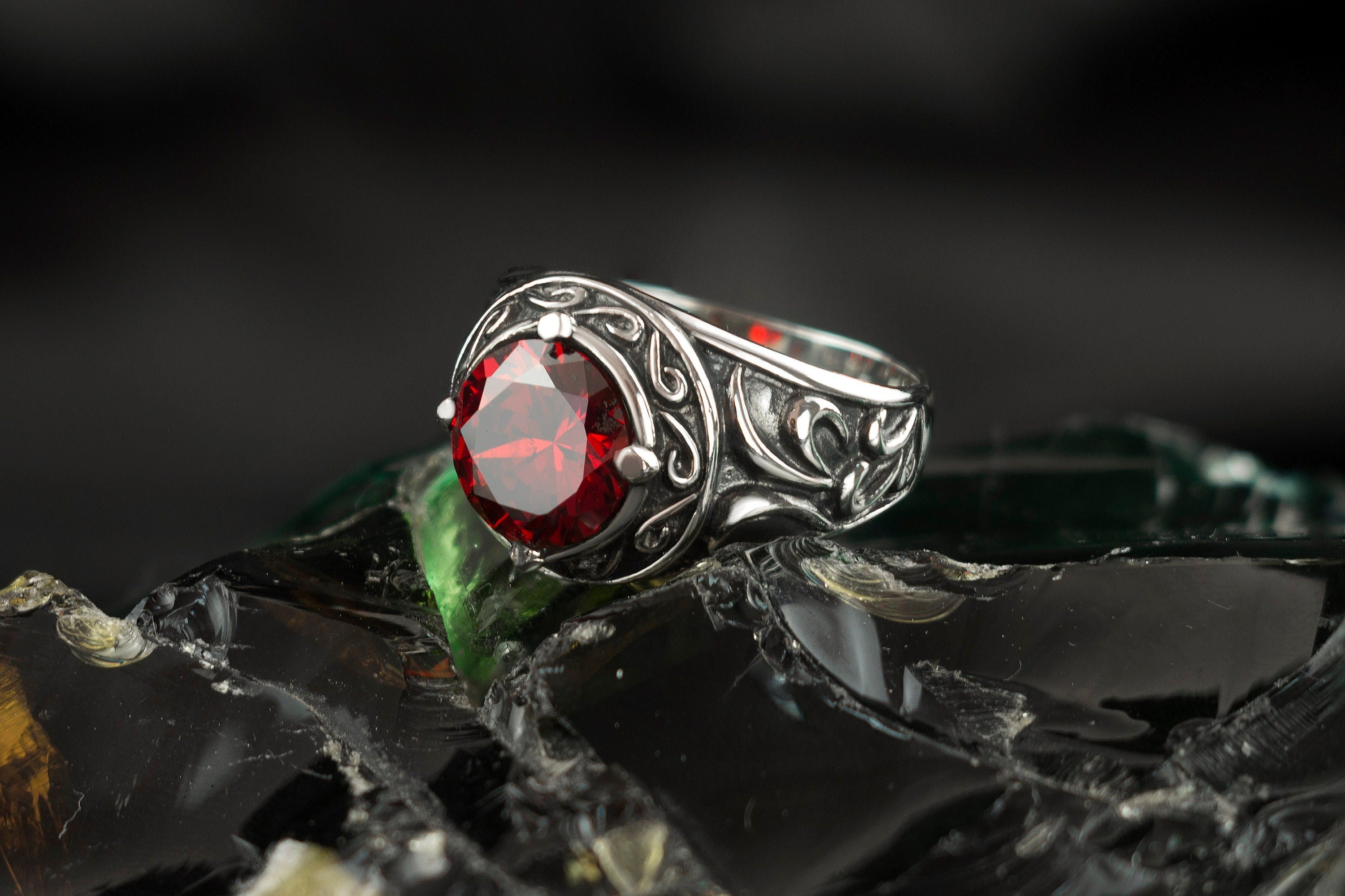 Viking sterling silver signet ring with large red stone and oxidized Norse knotwork