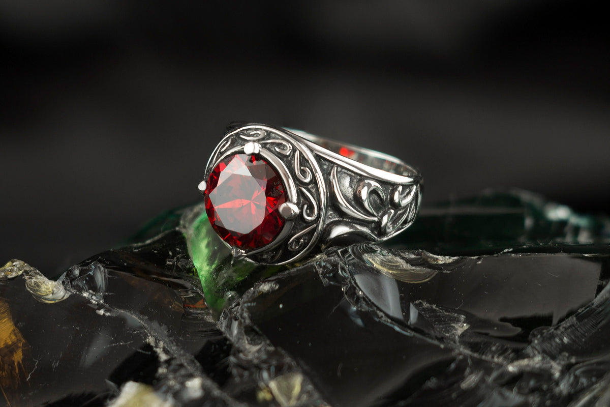 Viking sterling silver signet ring with large red stone and oxidized Norse knotwork
