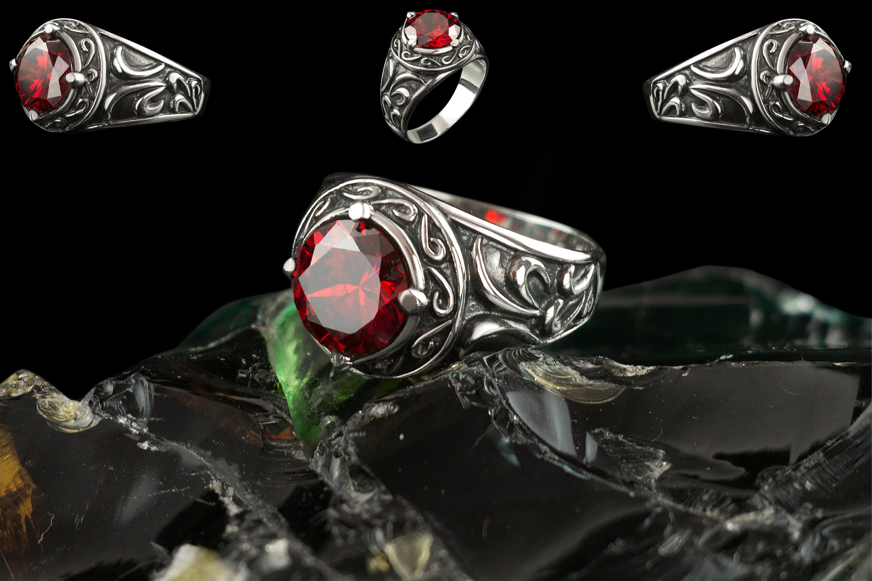 Viking sterling silver ring with red stone shown from several angles