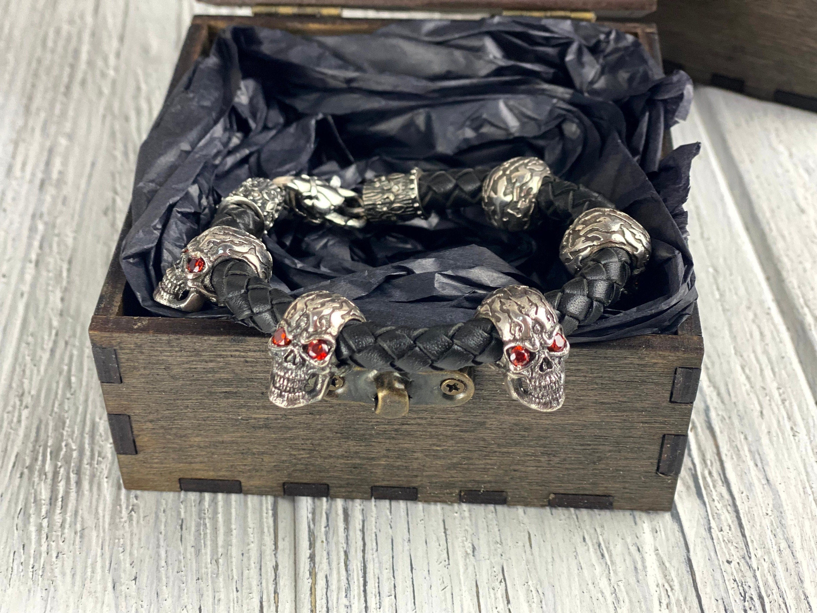 Wild skull bracelet inside an open wooden gift box