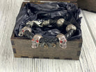 Wild skull bracelet inside an open wooden gift box
