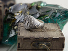 Yggdrasil silver ring angled view with Celtic knotwork shoulders