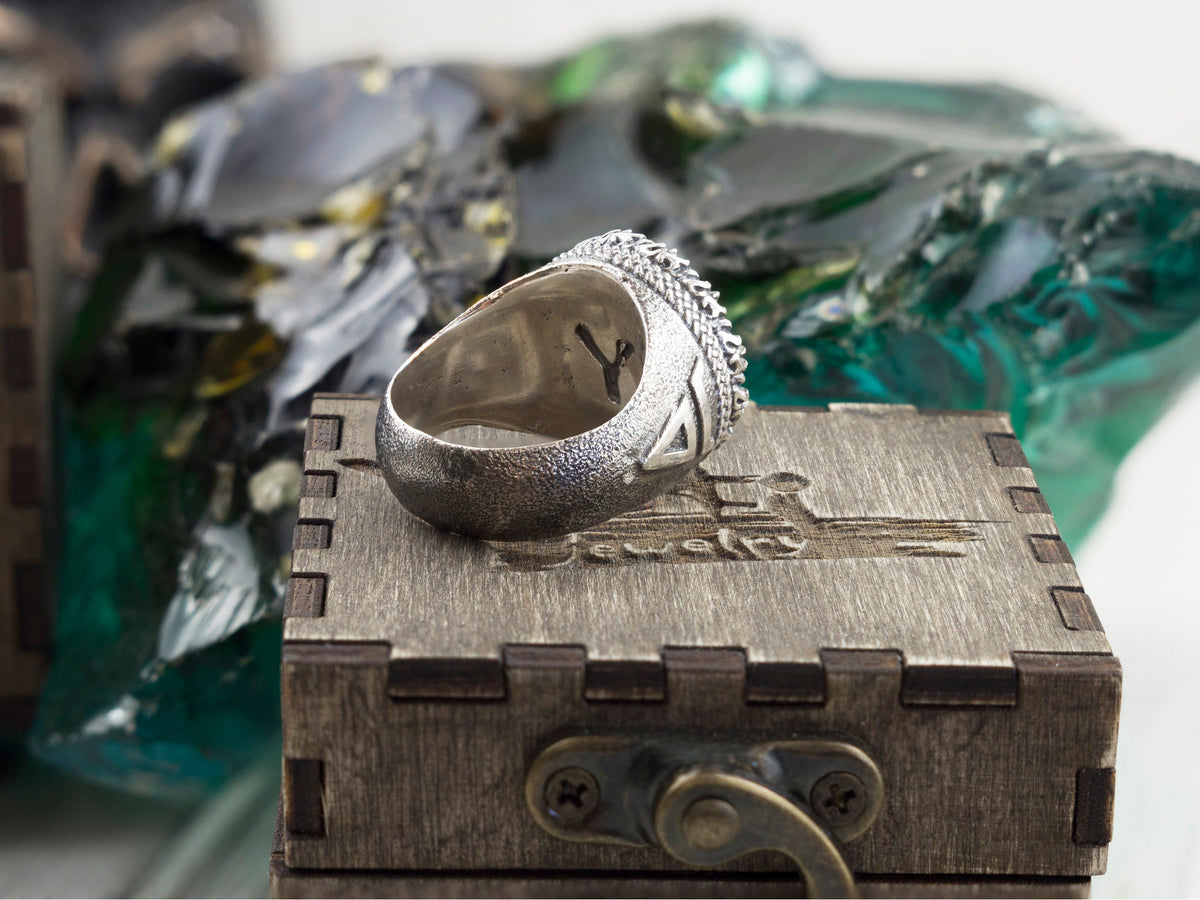 Yggdrasil ring side profile showing the oxidized knotwork