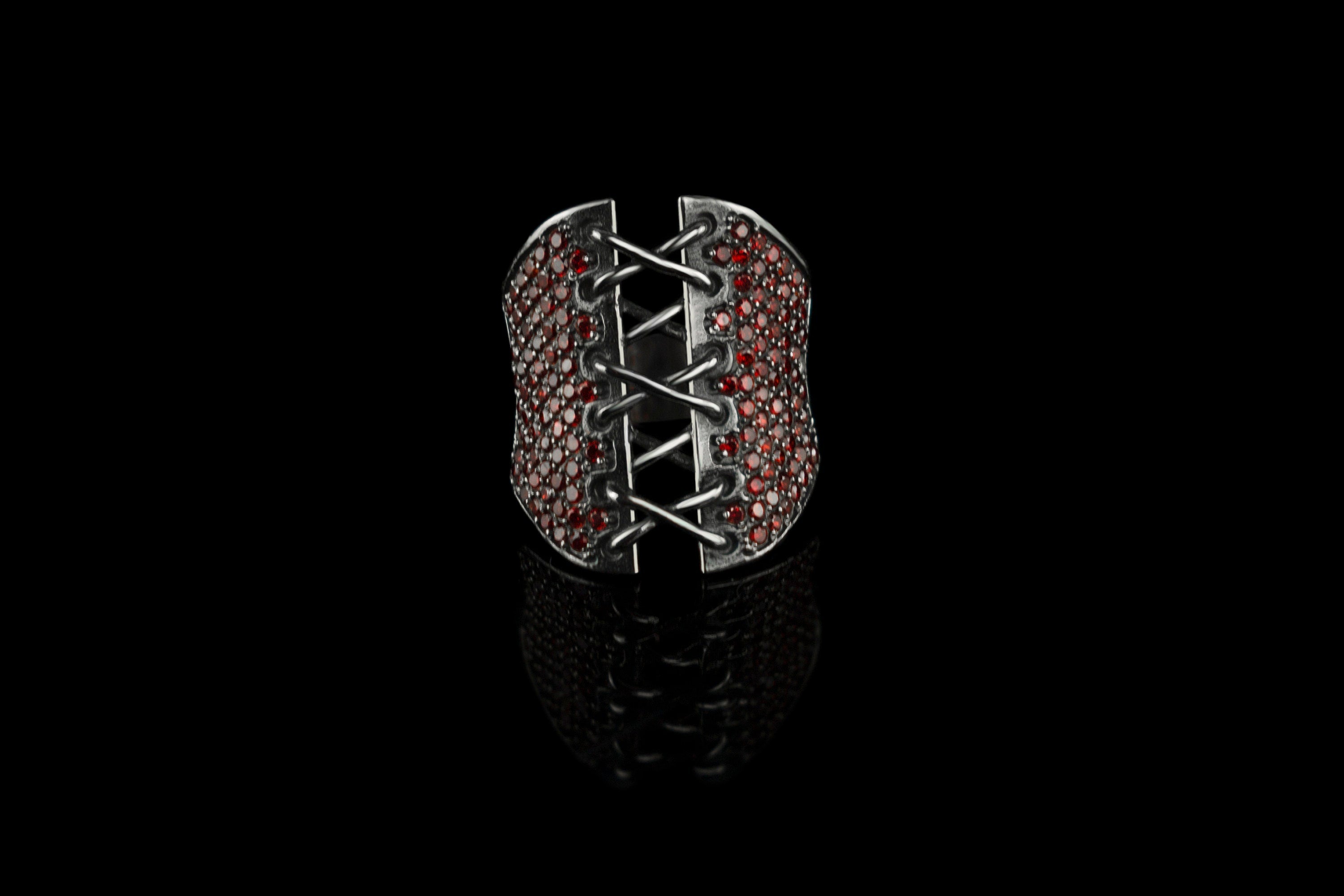 Corset Ring with red gemstones