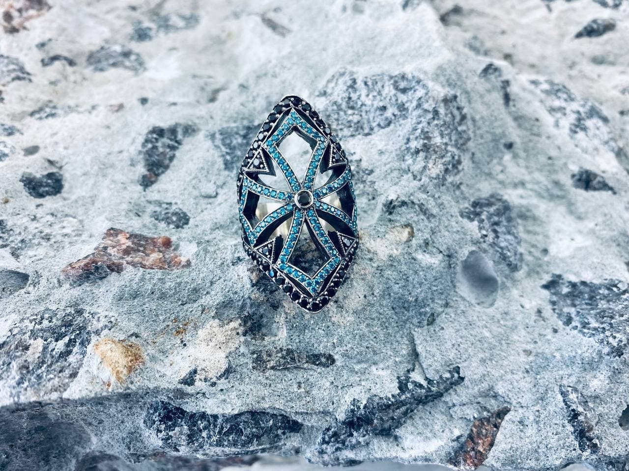 Queen of the Crusaders sterling silver ring standing upright, front view of the openwork cross