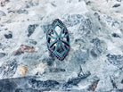 Queen of the Crusaders sterling silver ring standing upright, front view of the openwork cross